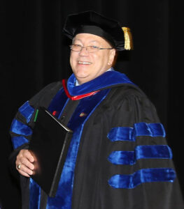 Dr. Bricker processes into the 2017 Pharmacy Commencement.