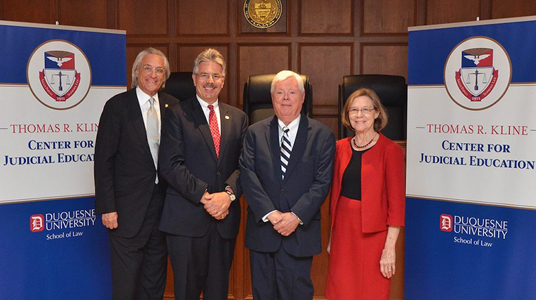 From left, Thomas R. Kline, President Ken Gormley, Chief Justice Emeritus Thomas G. Saylor and Maureen Lally-Green, law professor emerita and retired judge of the Superior Court of Pennsylvania.